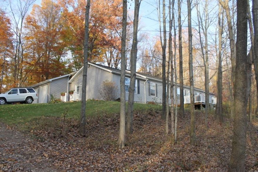 9795 OLD DELAWARE ROAD (SR 229). Escape to the Country! This gem sits way back a long lane with 5+ Ac, pond, woods, plenty of wildlife. 3 BR, 2 Bath, 2052 s.f. + full, unfinished 12 course basement & a 3 car 24x30 attached garage. Relax at the end of the day on the shaded back deck overlooking the pond deer trails and fenced garden. Room for deer feed plots to attract even more. The open floor plan with fireplace, kitchen, dining and family rooms leaves plenty of room for entertaining large families during the holidays. Priced right, this home will not be on the market long. Includes all appliances, including washer & dryer. Easy commute on SR 229, just west of Mount Vernon, a couple hundred feet east of Blue Road. Mount Vernon Schools. Shared drive to house further back.