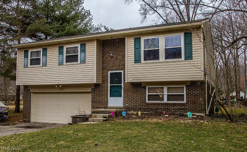 Welcome Home to this wonderful Bi-level in the very desired Stow-Munroe Falls Schools! The kitchen in this house is a complete chef's dream! Completely re-modeled in 2011 with Granite countertops, Kraftmaid Maple/white cabinets, soft close, built ins, pullouts, ceramic tile flooring and newer appliances Other updates to the house include: Refinished hardwood floors, Roof in 2012, Complete bathroom remodel in 2005, and a brand new sliding glass door! Furnace & A/C serviced an sold with 1 year home warranty. This home has 3 bedrooms, large full bath, 2 car attached garage, close to elementary school. Huge backyard to enjoy, plenty of room for entertaining on the wonderful deck. Convenient location! Call for a showing today!