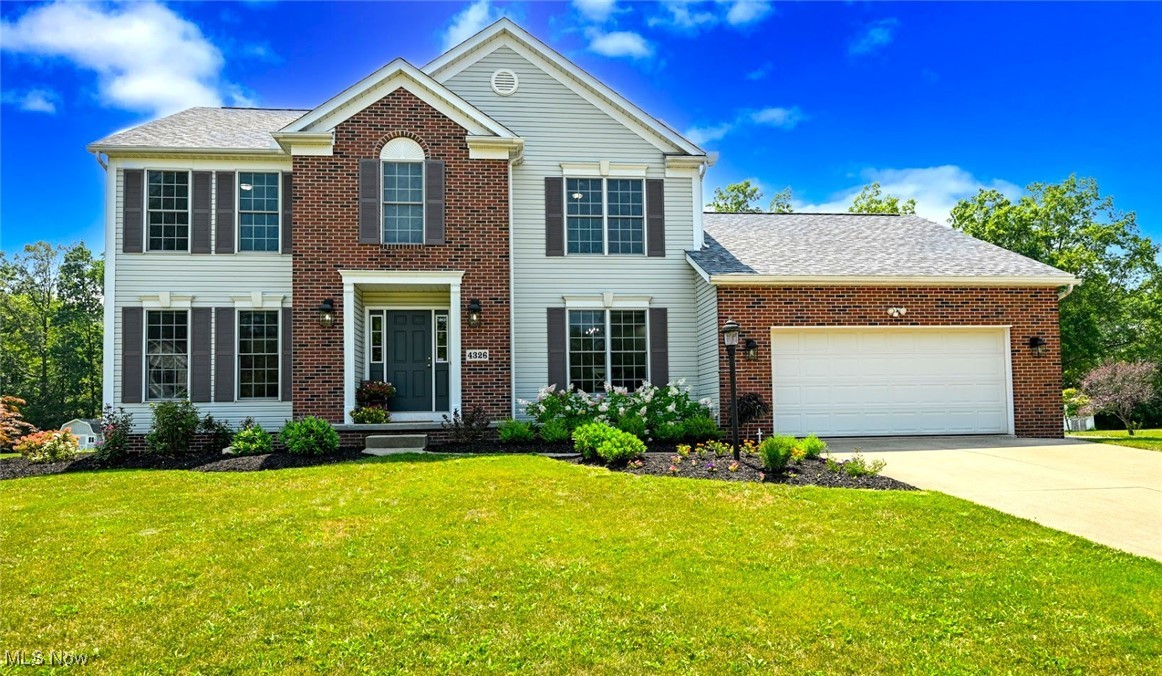 *PRISTINE Colonial In Rootstown LSD Showcases 3,554 Sq. Ft. Of Finished Living Space Including 4 Bdrms, 2.5 Bathrms, Sunroom & Huge FINISHED Basement! *Attached 2 Car Garage W/Bumpout Extra Area For Bikes & Cold Water Faucet *PATIO, Flat Back Yard W/Trees Behind On Over HALF AN ACRE, Shed & Swingset *Peaceful Setting On A No Outlet Street ~ Yet Conveniently Very Close To An Expressway, Great Curb Appeal, Nicely Landscaped And Pride In Ownership Shows! *Major Updates --> Brand New ROOF '21, Downspouts, Refrigerator, Sump Pump '22, Garage Door, Shed '20 & Within The Last Two Years: Finished Basement, All New Landscaping, Remodeled 1/2 Bathrm, Paint, New Dishwasher, New H20 Tank, Toilets, Chandeliers/Lighting *Surround Sound Speakers Throughout! *Walk In To A Foyer W/Hardwood Floor, Double Coat Closets & Crystal Lighting Fixture *The Living Rm Has French Doors To A Cozy Family Rm W/Gas Stone Fireplace & Triple Windows *The Eat In Kitchen Boasts GRANITE Countertops, ISLAND W/BREAKFAST BAR, Tile Backsplash, Gun Metal SS Appliances, Caged FARMHOUSE Black Above Island Chandelier, Above Cabinet Lighting & PANTRY W/Tiled Floor! *Pella Sliders To An Amazing SUNROOM! So Relaxing After A Long Days Work To Sit Or Lay & Enjoy The Sound Of Birds Chirping And Fresh Air W/Triple Sided Windows & Sliding Door W/Screens! Ceiling Fan, Light + Outlets *1st Floor Laundry Rm & Half Bathrm *Upstairs Are 4 Bedrooms Including The Master Suite W/French Doors, HIS & HER WALK IN CLOSETS, VAULTED Ceiling + Ensuite Full Master Bathroom! Walk In Shower, GRANITE Countertops, His & Her Sinks, Dual Crystal Wall Sconces & Corner Garden Tub *2nd Full Bathroom *The Finished Lower Level Provides Two Sides Of Connecting Recreation Entertaining Rooms W/Soft Carpet, Modern Black Ceiling & Recessed Lighting. Great For A Full Sports Game TV Room For Guests W/Tons Of Space For Furniture Plus Another Side Area For The Kids *Great Size Storage Room *This Is One You Don't Want To Miss! *LIVE VIDEO