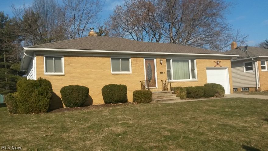 This is a beautiful and well cared for home.  Newer roof, windows, glass block, doors, kitchen and bathroom.  Gleaming hardwood floors in the bedrooms, plush carpet in living and dining rooms.  All appliances and window treatments stay.  Fenced back yard with patio, attached one-car garage.  Ceiling fans in all bedrooms, dining room and kitchen. Newer furnace with electronic filter and central air.  This home has been impeccably and lovingly maintained.  Move-in ready for immediate occupancy.