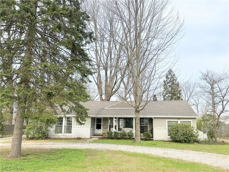 This cozy 3-bedroom cottage ranch nestled on a half-acre wooded lot can be your new home. LOCATION, LOCATION, LOCATION Located within minutes of everything on a quiet wooded street.  The home features a circular driveway.  Walk into the beautiful natural light in the living room with a fireplace. There is a step-down family room that could be used as 4th bedroom.  Hardwood floors throughout the house and even under bedroom carpet.  Adorable, oversized laundry room on first floor with two doors for outdoor access.  The natural sunlight is with huge windows is so beautiful throughout the home.