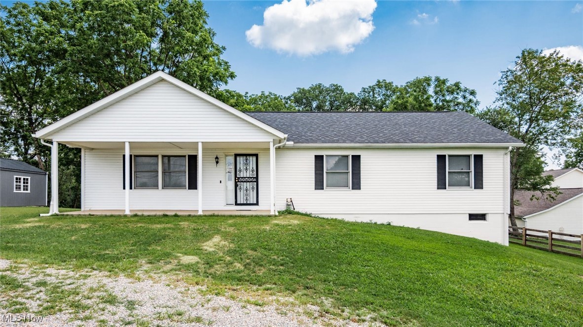 Move-in ready and completely remodeled 3-bedroom, 2.5-bath ranch offering comfort, style, and convenience. This beautifully updated home features a spacious layout with modern finishes throughout. Enjoy a full walkout basement, newer HVAC system, and hot water tank. A covered front porch is perfect for morning coffee or evening relaxation. The property includes a spring-fed pond and a 14' x 40' detached building—great for storage, hobbies, or workspace. Home is equipped with security cameras, which do not convey. Conveniently located with easy access to local amenities—schedule your showing today!