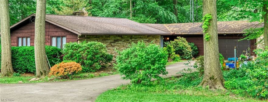 You won't be disappointed with this sprawling Ranch located close to shopping and the highway. Open eat-in kitchen has been
updated with a large island, an open eat-in area, large built-in cabinets, and a wall of windows to your private backyard. The large full bath has been totally updated with easy access from the kitchen area. Formal living room with a fireplace and a four-season room with all natural lights. The exterior has a wrap-around deck and patio area for your backyard enjoyment. The full bath is accessible from the master bedroom with plenty of storage. There is a full basement that would be easy to finish with additional living space. Great lot with plenty of privacy!