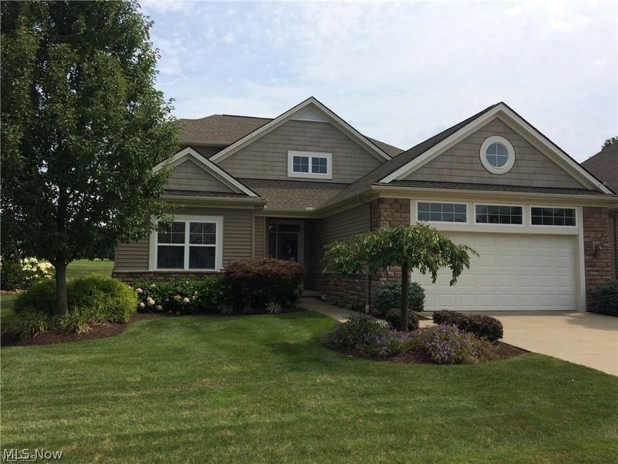 Spectacular custom built cluster home in the highly desirable golf course community of Wiltshire. Dynamic open floor plan offers 1 floor living plus loft area and luxuriously finished lower level. Loaded with upgrades throughout. Turn key move-in condition. Dramatic great room with cathedral ceiling is completely open to the kitchen and features an amazing custom bar area plus slider access to extensive patio with breathtaking views of the 16th green and surrounding woods. Chef's gourmet kitchen with custom cabinetry & granite counter tops. Gorgeous 1st floor master suite with vaulted ceiling, patio access, glamour bath with 2 vanities & large walk-in closet. Laundry room & 2 more bedrooms complete the first floor. 4th bedroom & full bath off the loft makes an ideal guest retreat. 14 course basement offers high ceilings and a multitude of possibilities for casual entertaining. The lower level features a family/media room, game room, exercise room, full bath, wine room and golf practice