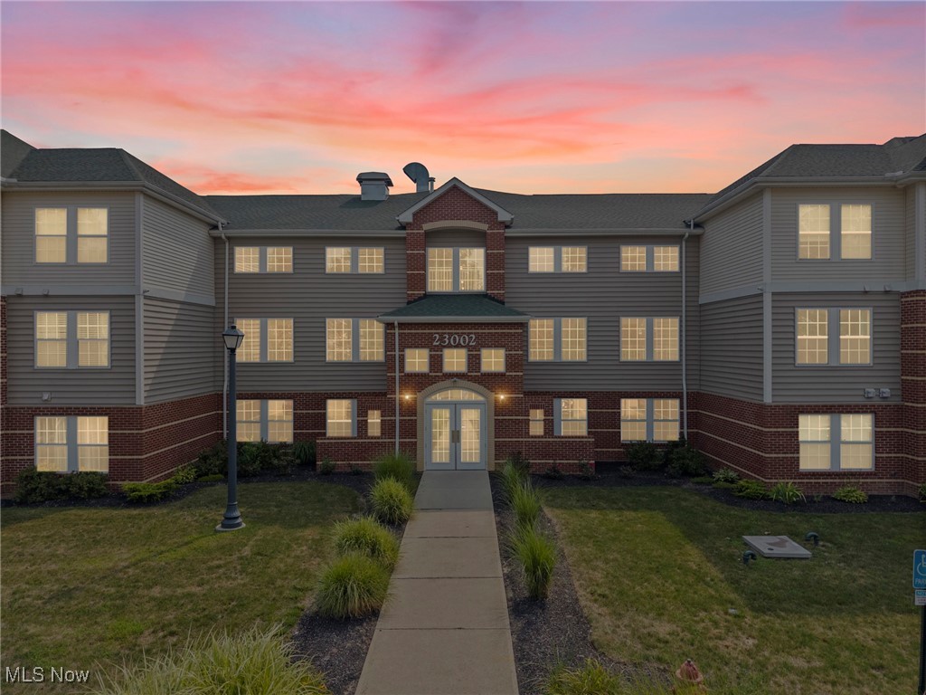 This spacious 3-bedroom, 2-bathroom condo offers modern comfort, low-maintenance living, and an ideal location in the heart of Olmsted Falls. Built in 2020, this second-floor unit features an open-concept layout with warm, dark wood-style flooring, a bright kitchen with white appliances, a peninsula for casual dining, and ample cabinet space. The primary suite includes an ensuite bathroom and a walk-in closet, while two additional bedrooms provide flexibility for guests, a home office, or hobbies. A dedicated in-unit laundry room and an attached one-car garage add convenience. Enjoy your morning coffee on the private balcony or take advantage of the community amenities including a pool, gazebo, and beautifully landscaped grounds. With an elevator in the building and maintenance services that cover landscaping, snow removal, trash, water, sewer, and more, this condo is perfect for those seeking a worry-free lifestyle. Located close to shopping, dining, parks, and major highways—this is one you won’t want to miss!