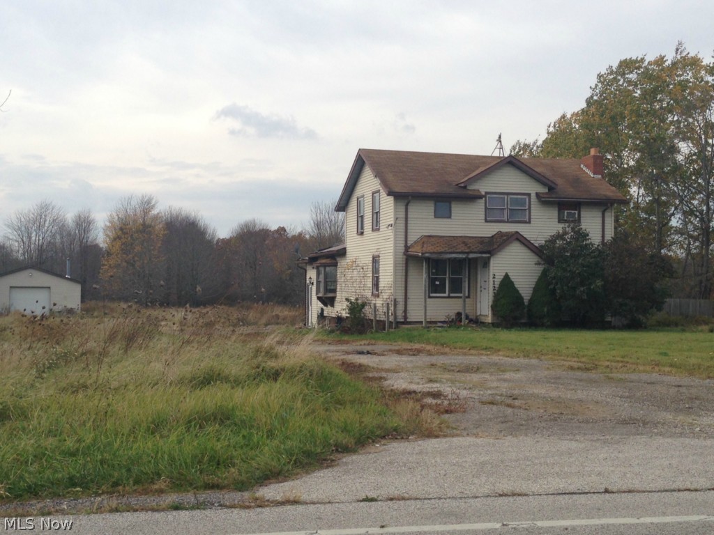 3 bedroom, 2 full bath colonial, full basement, deck, 2 car detached garage, on a 5 acre lot.