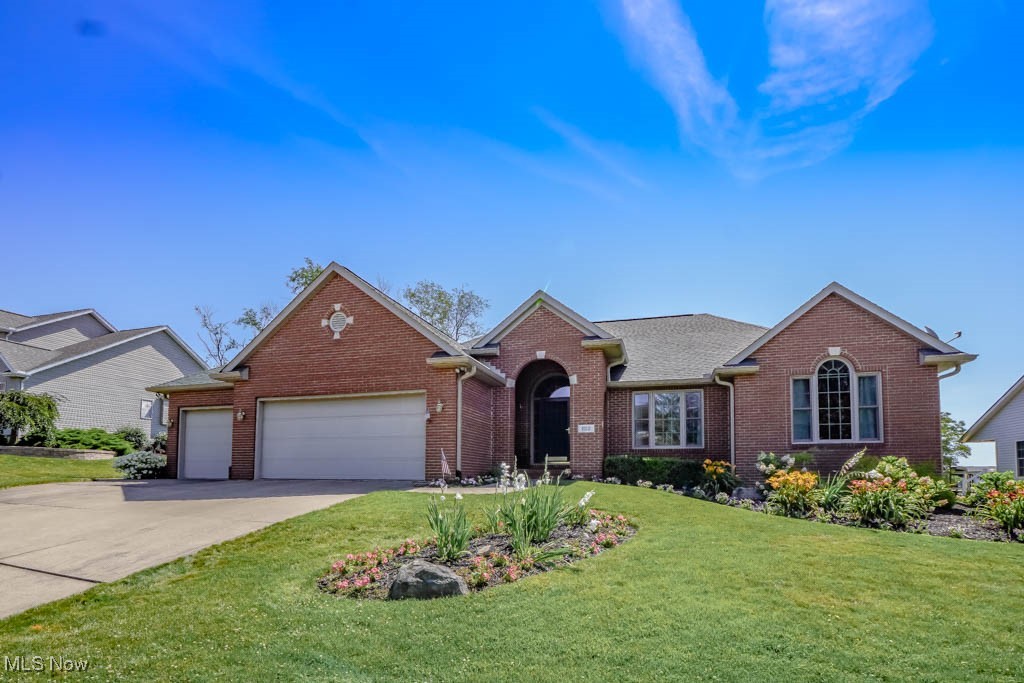 You’re going to love this 3 bedroom ranch in Tuslaw’s Country View Estates! It starts with great curb appeal, thanks to the tidy landscaping, arched front entry, and 3 car garage. Step inside to a bright foyer with a tray ceiling that opens to the vaulted great room, where a gas fireplace adds a cozy touch. A pillared doorway leads to the formal dining room with crown molding and chair rail, perfect for holidays and special dinners.
The kitchen is set up for everyday living with a center island, hardwood floors, lots of cabinet space including a pantry, and a pass through window to the dining room. A sunny dinette opens to the year round sunroom with direct access to the backyard, giving you even more space to spread out.
Down the hall, the primary suite includes a walk in closet and a private bath with a double sink vanity, jetted tub, and step in shower. Two more bedrooms with double closets share the main full bath. A convenient first floor laundry with half bath and a spacious basement with tons of storage finish off the layout.
Nicely cared for and move in ready, this one is worth a closer look. Call to see it today!
