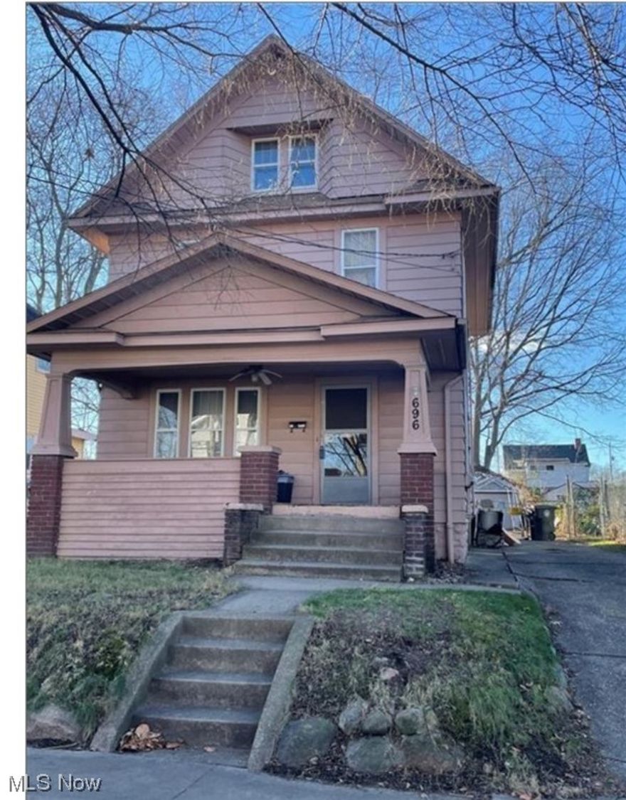 Welcome to this early 20th century home built in 1917, with four bedrooms and two full baths. 
As you enter from a nice sized covered porch into this Colonial two story home (actually three), you’ll find a nice sized living room with fire place, original hardwood floors, beautiful oak trim, built in’s, and a pocket door. 
The main floor also features a nice size dining room, kitchen, and a full bathroom.
Walking up the original hardwood steps to the second level you’ll find three carpeted, nice sized bedrooms - and a sunroom,filled with natural light, connecting with the primary bedroom. The second level also includes a full bathroom easily accessible from all three bedrooms.
As you continue to the third level of the home you’ll find the fourth and final bedroom extending the full length of the home with an abundance of storage space on either side of the room.
The basement has been waterproofed by Ohio State Waterproofing and features an additional stand up shower, mechanicals, glass block windows, updated electric, sump pump, and a brand new water line that runs to the curb.
Outside the home you will find a private concrete driveway leading to a detached two car garage and a fenced in yard.
Don’t wait… schedule your showing today.
