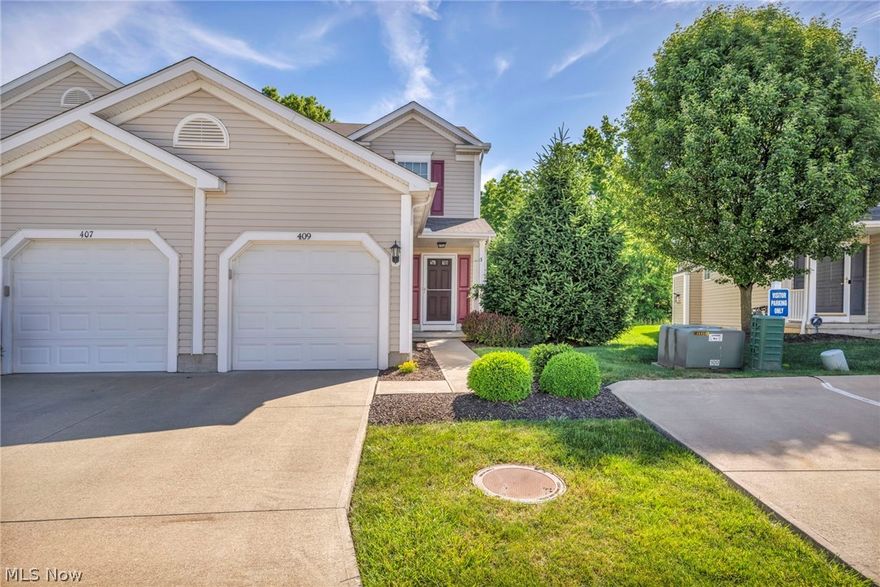 This impeccably maintained end unit welcomes you in through the bright foyer which features two closets.  Off the foyer are the garage entry and the half bathroom. The eat-in kitchen includes an abundance of cabinet space, stainless steel appliances, and overlooks an open and spacious living room. The living room features a fireplace, plenty of space for entertaining, and slider doors out to the private and serene back patio.  This unit is located in a prime location with lush green space and wooded area behind the yard. The spacious main bedroom has an impressive walk-in closet. The second bedroom is also spacious with a large closet. A lovely full bathroom with tons of counter space and a linen closet are also on the second floor. The full basement is pristine and includes the laundry space and tons of space for storage or to finish for another living space or guest room.  The one car attached garage also enters into the foyer for ease and convenience.  Updates include second floor carpet (2021), LVP flooring (2019), dishwasher (2023), painting throughout, & new composite steps (2023).  This quiet, well kept community is in a great location close to Crocker Park, Avon Commons, Lake Erie, and many parks.  Convenient to all of the wonderful amenities of Avon Lake and the surrounding communities, and part of the highly ranked Avon Lake school district.  Don't miss out on this opportunity!