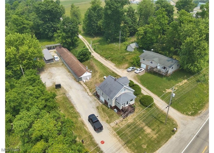 Animal Rescue facility is up for grabs! Former use was a motel and since new ownership, many updates were made to this property.  Let your imagination determine what the current use will be!  Return to former use of motel, convert to office space or stay with current use of animal shelter or doggie spa! Sellers made many improvements including but not limited to Generac generator, HVAC, flooring, bathroom, plumbing, concrete, added kennels, furnace for home, etc.  For complete list of improvements, see Improvements list in supplemental docs.