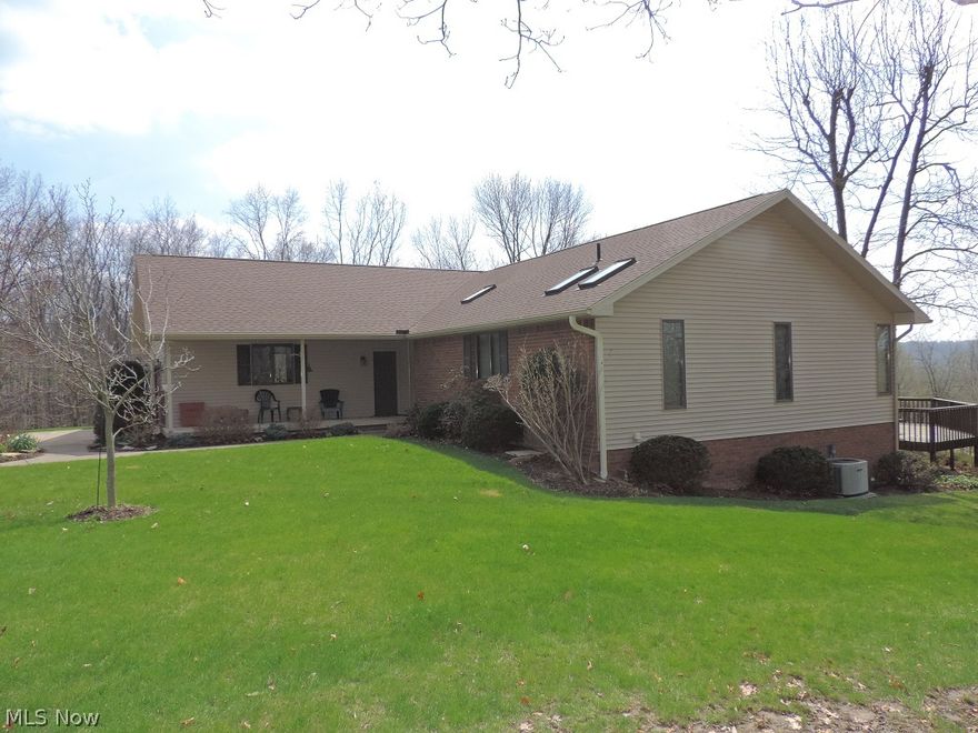 Enjoy the Fabulous view from the tiered deck overlooking 4.1 acres of the Valley. Peaceful setting. Home features 3,900 sq. ft. of finished living space. One story with finished lower level that walks out to stone patio. Floor plan is open concept with wall to ceiling stone gas fireplace in great room. Great home for entertaining. Family room with wood burning fireplace and oak custom-built bar plus wet bar. Master suite has walk-in closet plus a double closet and master bath. Master bath has whirlpool tub plus separate shower and double vanity. Very spacious rooms. Updates include new Frigidaire kitchen appliances, roof on house and pole building, water heater, water softener, A/C units and gutter guards. This is a great Quality-built home with Anderson windows and sliding patio doors. Lots of Natural light throughout. Landscaped with flowering trees, shrubs and flower gardens. Utilities: gas avg. $87 and electric $102. Agent see Broker Remarks.