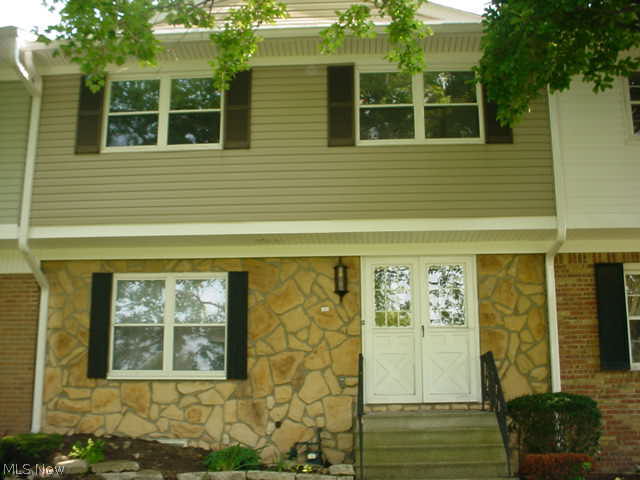 3 bed, 2 1/2 bath condo with full partially finished basement! Nice bright kitchen w/appliances and ceramic tile. Wet bar, L shaped living room/dining room! On golf course, 18th hole! 2008 new windows, 2013 roof, 2014 AC & electric panel! Basement family room w/wet bar! Master bath w/ 2 sinks, 2 closets and unique curved wall! Private patio & 2 car garage! $220 month condo fee includes Time Warner Cable!