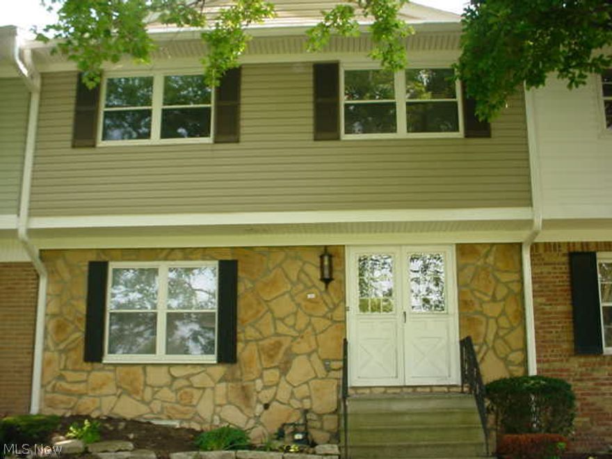 3 bed, 2 1/2 bath condo with full partially finished basement! Nice bright kitchen w/appliances and ceramic tile.  Wet bar, L shaped living room/dining room! On golf course, 18th hole! 2008 new windows, 2013 roof, 2014 AC & electric panel! Basement family room w/wet bar! Master bath w/ 2 sinks, 2 closets and unique curved wall! Private patio & 2 car garage! $220 month condo fee includes Time Warner Cable!