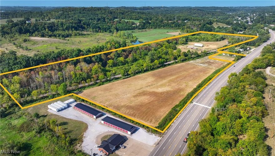 Located on State Route 40, this amazing 30+ acre parcel is not just a beautiful piece of property; it also comes with a booming topsoil business that’s ready for its next owner to take it to the next level!  Wide open spaces perfect for expanding the business or adding new ventures.  This business is already up and running, with loyal customers and a great reputation in the community. The topsoil is in high demand, and the market is only growing! You’ll be stepping into a business that’s already profitable. No need to start from scratch. The seller is also willing to train new owners.  You can hit the ground running with included equipment; tracted skid steer with high-flow tiller attached and screener also huge hoop storage building (30x90), added in 2023, already stocked.  Large Concrete Pad, 240'x210'(50,400 sq ft), that has many possible uses.Office space also available for lease from the seller.