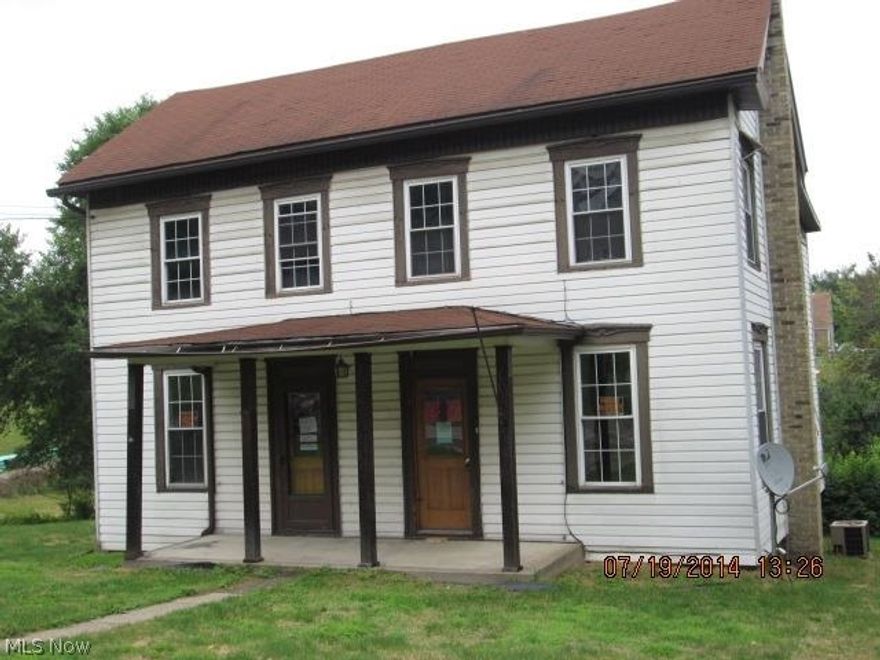 Large 2 story home. Covered front porch. Detached 2 car garage. Large rooms. case #412-574514. Agents see associated docs. FHA UI, Equal Housing, and Sold As IS.