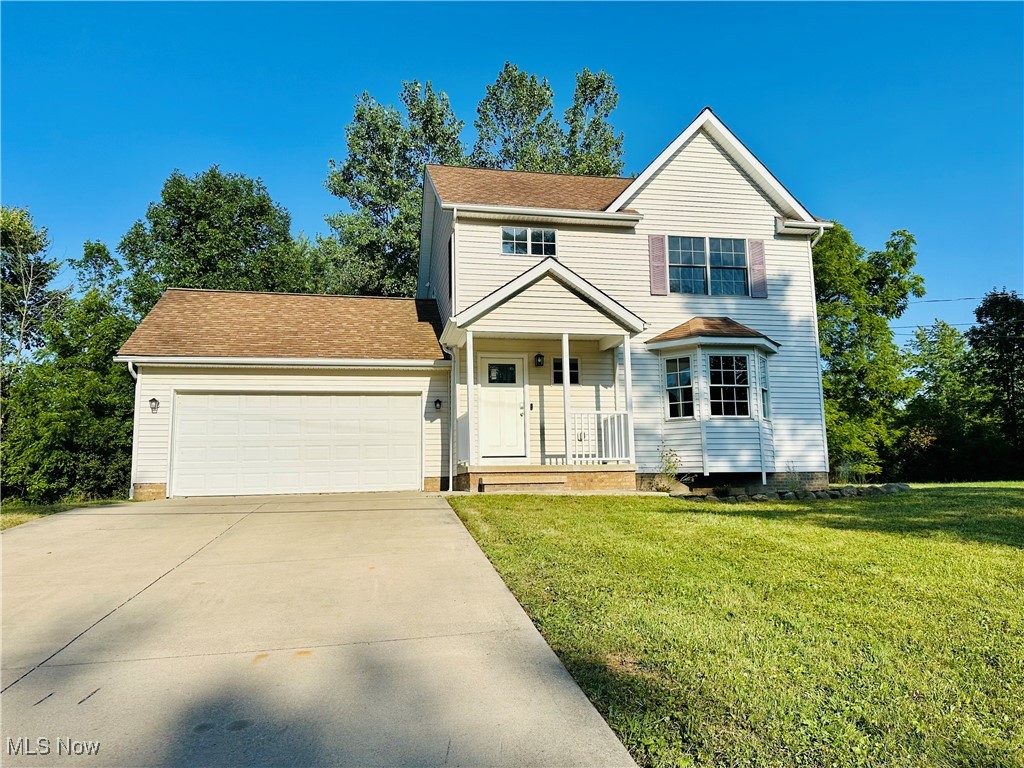 Welcome to this beautifully renovated and move in ready colonial only minutes away from downtown Chagrin Falls. Modern kitchen features newer kitchen cabinets and granite countertops, newer stainless steel appliances and beautiful vinyl floors. Spacious living room with a bright and cozy dining area. Kitchen area has a slider for summer relaxation on the massive wooden patio deck. This home is enjoys loads of natural light, and offers nicely sized rooms. You'll find 3 spacious bedrooms each with great closets and a full bath upstairs. In the fully finished lower level there is room for setting up a multiple living spaces such as family room, a kids play area or a home office. Second full bath, laundry and mechanical rooms complete this level. Five parcels combined for a total of .30 acre which backs up to the woods, affording a bit of privacy and serenity. One block off the CF Park playground. Seller is including a one-year APHW home warranty! Don't miss this opportunity!