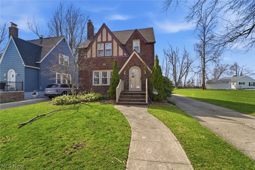 The only thing missing in this listing in YOU!! Located on Walnut Blvd featuring lake views and easy access to Lake Erie. Walk several houses down and sit at Highland park and watch the sunset. All On beautiful Walnut Blvd with Lake Erie views!! All furniture and kitchen supplies remain it is turn key ready all you need is you!!The brick fireplace in the living room gives extra charm to this 2 story Tudor style home. Location is perfect being close to Bridge Street and Walnut Beach with playgrounds and tennis courts. Numerous upgrades. There is a main floor office if you need to work from home. Relax and enjoy the bonus room on second floor where you can relax and see Lake Erie!! Kitchen updates include water proof vinyl plank flooring, new counter tops, new ceiling fans and and includes new appliances. YOU can enjoy coffee in the breakfast nook. Well maintained home! All this a ONE YEAR HOME WARRANTY!!!