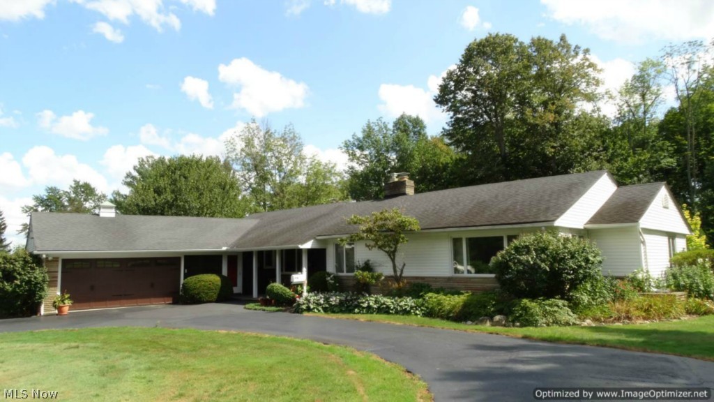 Enjoy One Floor Living in this Sprawling Ranch on over 2 Acres! Bright & light with large windows, 2 fireplaces, custom built-ins & neutral decor throughout. This 2 Bedroom & 2.5 Bath home offers a Formal Living Room with wall of windows, wood burning stone fireplace & built-in bookshelves. Formal Dining Room with built-in china cabinet. Country Kitchen with abundance of cabinetry, ceramic floors through to Eat-in Breakfast area. Walk-out to private deck and fenced gardens. Warm & inviting wormy chestnut Family Room with hardwood floors & wood burning brick fireplace. Large Master Bedroom Suite with walk-in closet & Private Bath has been completely remodeled with ceramic walk-in shower, new vanity, all new fixtures & lighting. Second Bedroom with new carpet & Full Bath also updated with recessed jetted tub & ceramic shower. Enjoy views and your morning coffee from the freshly painted screened in porch with ceramic floors. Partial basement with glass block windows ready for you to finis