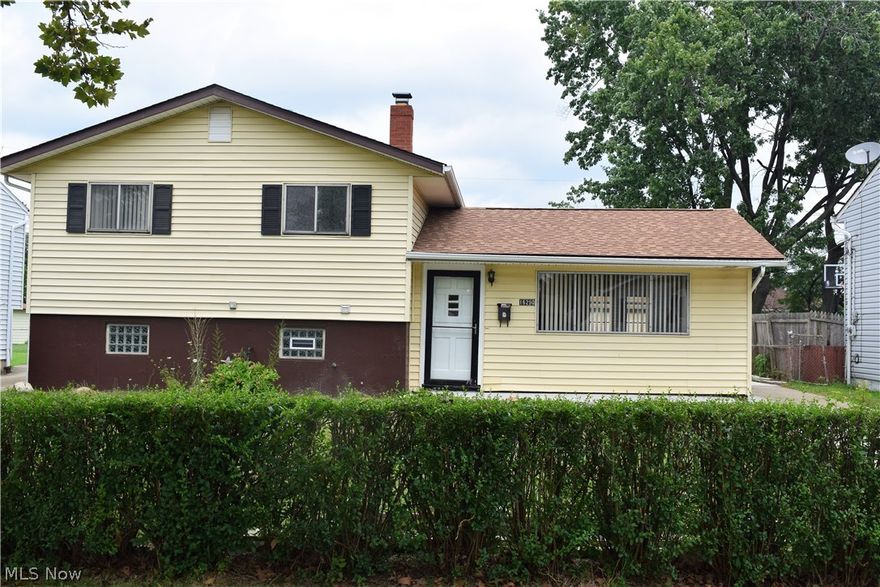 Move in ready, Split level home, This home features 3 large bedrooms and a remodeled bath. Large living room on the main floor. Kitchen with eat in area. Partially finished basement that can be used as family room/rec room. Newer block windows, Recent updates include, Newer furnace and Central air, ( 5 yr warranty), Recently installed laminate floors in the kitchen, family room and foyer. Newer Carpeting in the living room. stairs and Hallway, New Cement porch sidewalk, Partially finished driveway. Easy to show