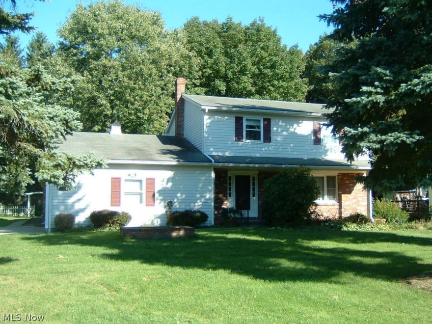 Very nice, 3BR Colonial w/2 full and two half baths. Double garage with recessed lighting. Brick and wood exterior. Concrete driveway. treed lot. front porch. Quiet, low-traffic street. High-efficiency furnace. C/A. Deep, rear yard abuts Churchill Park. Foyer entry w/slate floor. LR. DR. Updated eat-in Kitchen w/stained wood cabinets, breakfast bar, appliances, newer backsplash and counter-top and updated faucet. FR with log-burning fireplace and built-in shelves. Florida Room with full bath, plumbed for laundry. Remodeled powder room on the first floor. Three spacious bedrooms. Cedar closet. Newer carpeting on stairs, hall and in MBR. Hardwood floors in LR, DR and 2BR's. Rec Room in the basement. Separate storage room in basement. Storage in the crawl space which is under the FR. 200 amp electrical service. Reverse-osmosis drinking water system. IMMEDIATE OCCUPANCY. PRICED TO SELL! COME 'BUY' TODAY!