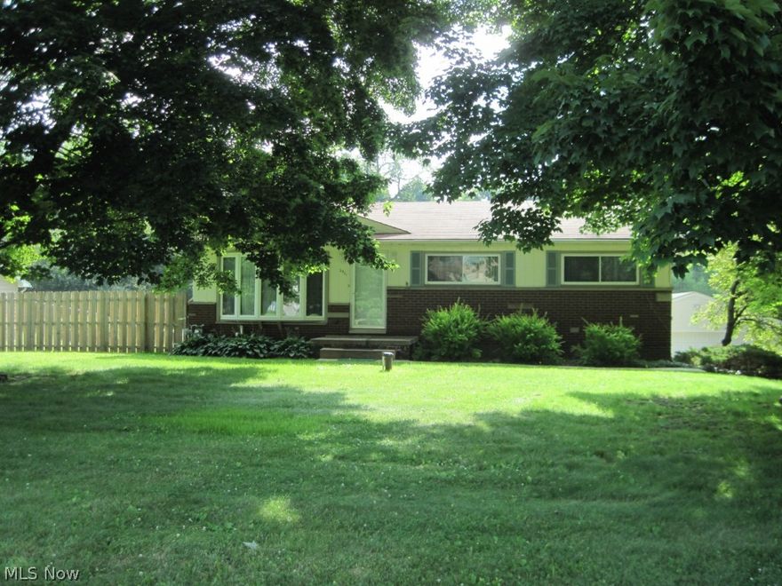 Welcome Home to this wonderful 3 bedroom ranch in the Green Local School District.  Situated on a beautiful lot, this home has so much to offer.  All of the bedrooms are good sized.  Two full baths, one of which is en suite to the Master bedroom.  A second kitchen on the walk-out lower level would be the perfect start to an in-law suite. Newer roof; central air; updated bathrooms and many other improvements have been made.  This home is a must see!