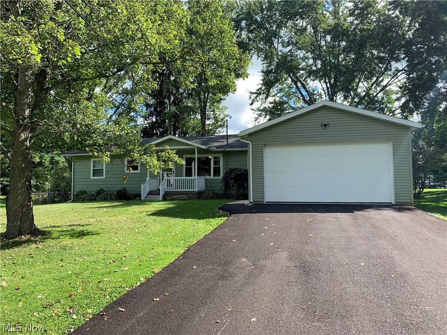 So many wonderful features about this move in ready ranch. The newly paved driveway leads to a 20x20 two car garage addition. The main living areas are such nice sizes and the cozy kitchen is the hub. You will be pleasantly surprised with the wonderful main bedroom and the bath/laundry offers ample room. A second bath could be easily added in one of three areas. The kitchen and dining room both have doors that lead to an incredible fenced in backyard! You won't need for space with this lot. The home has city water for inside and well water for outside! Perfect for washing the car or watering flowers and garden. Schedule your showing soon!