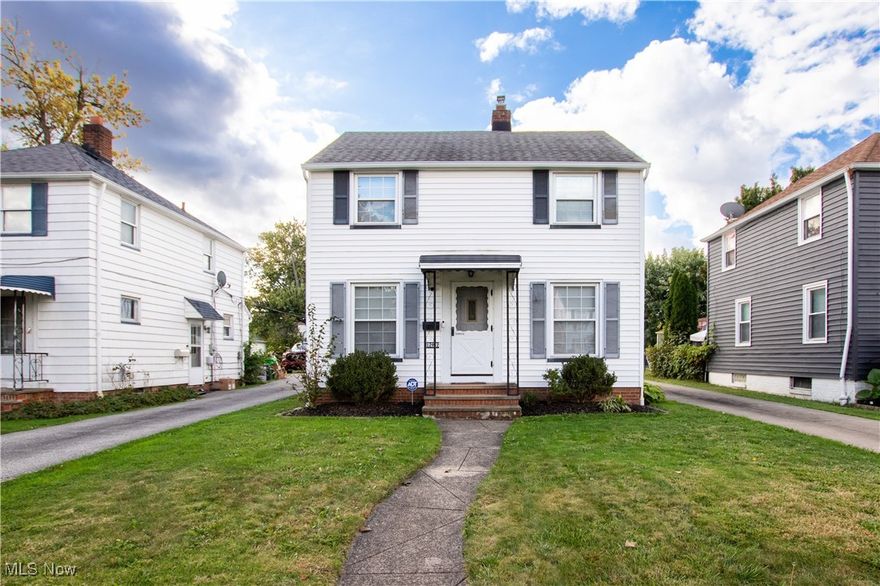 Welcome to 19212 Thraves Rd in the heart of Garfield Heights! This charming 3-bedroom, 1-bath colonial blends classic character with thoughtful updates and a convenient location.  Step inside and be impressed by the stunning refinished original hardwood floors and a bright, spacious layout enhanced by numerous windows. The large living room flows seamlessly into the formal dining room and kitchen, which offers plenty of room for an eat-in area or extra prep space. All appliances stay for the new owner's convenience!  Upstairs, you'll find an updated full bathroom and three comfortable bedrooms, two featuring new ceiling fans with light fixtures. The unfinished basement provides excellent potential with a workshop, ample storage, and updated electric, perfect for hobbies or future finishing. Throughout the home, you'll appreciate replacement windows that add efficiency and peace of mind.  Outside, the extra-long driveway leads to a 1-car detached garage, while the covered back porch offers the perfect spot to enjoy your morning coffee or unwind in the evenings.  Situated near shopping, dining, and convenient highway access, this home makes commuting to downtown Cleveland and the surrounding areas quick and easy.  Don't miss your chance to own this Garfield Heights gem!