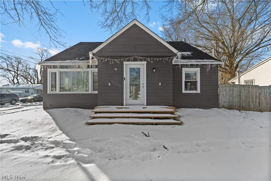 Welcome to this beautifully updated bungalow on a quiet street in Elyria, offering the perfect blend of charm, modern upgrades, and flexible living space. With two bedrooms on the main floor and a spacious primary bedroom plus bonus room upstairs, this home provides a layout that adapts easily to today?s lifestyles, whether you need a home office, guest space, or hobby room.

The main living areas feature newer hardwood flooring throughout the kitchen, dining room, and living room, creating a warm and cohesive flow. The kitchen is bright and inviting with white cabinetry and updated finishes, while the living room offers a cozy electric fireplace for year-round comfort. All appliances stay, including washer and dryer, making this home truly move-in ready.

Major updates deliver peace of mind, including a brand-new roof in 2025, new central air conditioning in 2023, newer windows (2013), furnace (2017), updated plumbing with PEX, and all new exterior doors. The detached one-car garage was built in 2025, offering modern convenience and storage.

Enjoy the outdoors in the fully fenced backyard with a wood privacy fence, perfect for relaxing, entertaining, or pets. The 10' x 20' three-season room with tile flooring adds valuable bonus space for lounging, dining, or hosting guests.

This home offers an outstanding combination of character, thoughtful updates, and everyday functionality. Schedule your showing today and see everything this property has to offer.