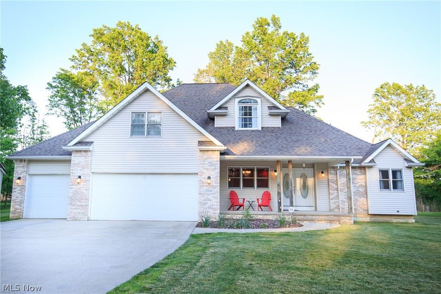 Come see this like new build today! This 4 bedroom 4 bath colonial was finished in 2011. Just a minute walk to the metroparks! This magnificent home features 2 extra large master suites with walk in closets, jetted tubs, vaulted ceilings, ceramic tile floors, and the 1st floor master with heated tile floor. Taxes are only $2852 a year! The spacious kitchen offers abundant countertop space with its 25+ cabinets, island, pull out cabinetry, mosaic tile backsplash, granite countertops, soft close drawers and built in wine bar! Walk into your 13 ft tall great room complete with wall of windows, custom fabricated steel and glass railing, fireplace, and a breakfast bar. Relax and enjoy evenings on the covered front porch.  This backyard is perfect for entertaining with its 45x12 trex deck that is accessible from the 1st floor master or eat in kitchen. Amble seating throughout at the breakfast bar, eat-in kitchen, and formal dining room. All equipment is top notch including the tank-less hot