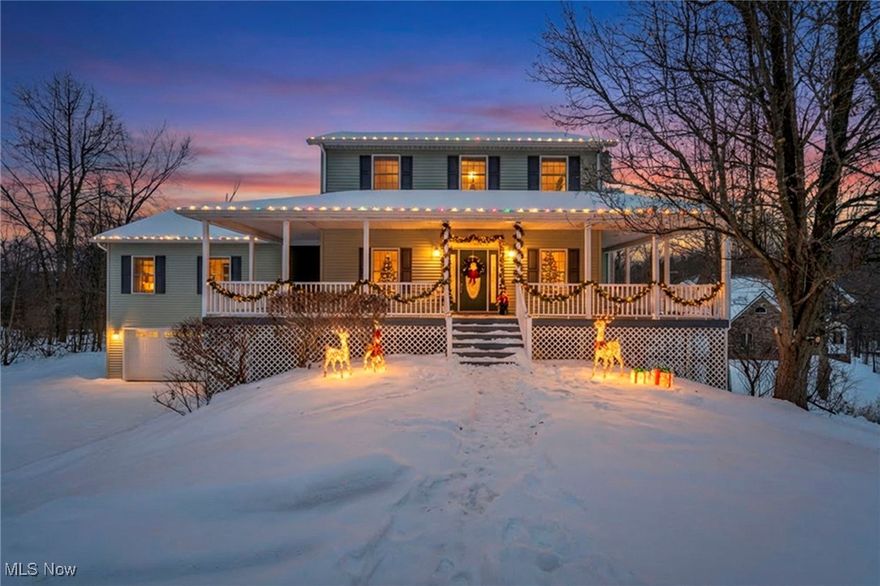 Inviting and beautifully maintained two-story home in one of Chardon’s most desirable neighborhoods—just a short walk to local schools, parks, and recreation amenities including swimming, tennis, and volleyball. A charming wraparound porch welcomes you into flexible living spaces, including a first-floor bedroom and a main-level office that could also serve as a formal dining room.

The spacious kitchen features rich maple cabinetry, Brazilian cherry flooring, a butcher-block island, double ovens, two pantries, and all appliances included—opening to a warm and comfortable great room with a gas fireplace and custom mantel. From the kitchen, access the renovated elevated deck (2025) overlooking an expansive, private, tree-lined backyard—ideal for outdoor enjoyment, gardening, and entertaining. Few properties in this area offer such a generous yard on a .64-acre lot.

Upstairs, you’ll find three additional bedrooms including a beautiful primary suite with brand-new carpet (2025), two walk-in closets with built-ins, and a newly remodeled bath showcasing modern finishes. The updated second-floor full bath serves the remaining bedrooms.

The walk-out lower level is prepped and ready to finish for additional living space. Major improvements include a new roof (2024), newer furnace and A/C (2022), tankless hot water system, and newer garage door.

A wonderful blend of timeless character and thoughtful updates—truly move-in ready.