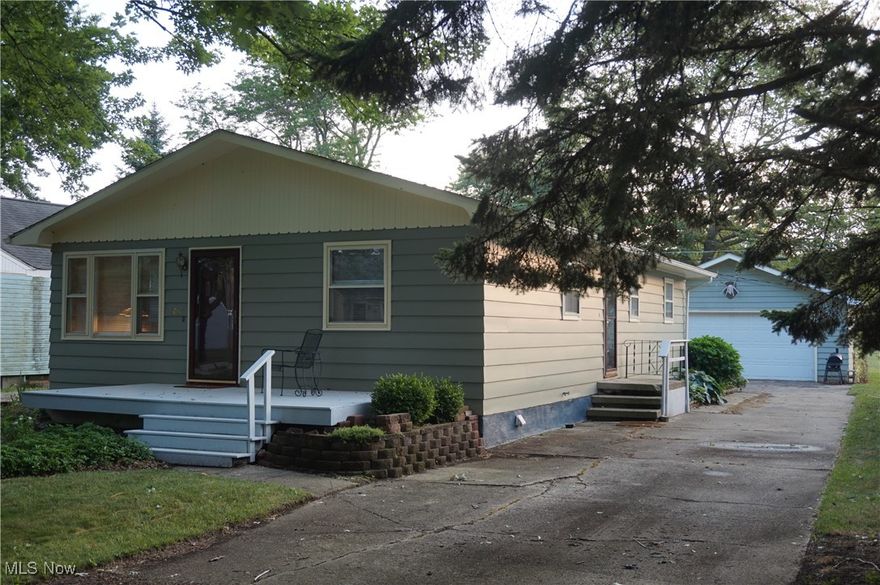 Adorable Coastal Ranch with a storybook cottage look: This 3 bed/1.5 bath home nestled near the shore of Lake Erie is not too big, not too small, it's just right. Living room opens to kitchen/dining rooms. Lots of windows for plenty of natural light, lovely hardwood flooring, wood cabinet kitchen, updated baths, plenty of closet space, beautiful secret garden with perennial flowers and rear gate that opens to Kent State University property. 2 car detached garage for convertibles, boats, fishing gear, drink lemonade upon the front deck and view the quaint tree lined street and enjoy comfortable summer lake breezes. New furnace, A/C, water heater and electric panel in 2019. Near Ashtabula County's 30+ wineries, Elks Club, Red Brook Boat Club, distilleries, Geneva-on-the-Lake, Historic Ashtabula Harbor Bridge Street with galleries , shops and restaurants, covered bridges, Spire, Lake Erie beaches, Ashtabula Yacht Club, Riverside Yacht Club, Kisters Marina. All at a dreamy price. Begin your new chapter at 1037 Elk Drive.