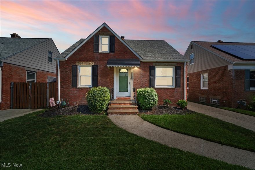Welcome to this beautifully updated three-bedroom, two-bathroom all brick Cape Cod bungalow nestled in the heart of Brooklyn, Ohio. Bursting with charm and modern upgrades, this home offers the perfect blend of classic architecture and contemporary comfort. Step inside to discover a freshly painted interior with newer flooring throughout, creating a bright and inviting atmosphere. The stylishly renovated kitchen features modern cabinetry,  a new breakfast bar, and newer appliances perfect for everyday living and entertaining. Both bathrooms have been tastefully updated with contemporary finishes. The home boasts newer windows, a newer roof, and a newer central AC system, ensuring comfort and energy efficiency year-round. Downstairs, the finished basement offers valuable extra living space ideal for a media room, home office, or recreation area. Outside, enjoy the curb appeal of brand-new landscaping and new awning over the rear patio and a spacious, newer two-car garage that provides plenty of storage and parking.The private rear yard is ideal for barbecues and entertaining.  With all the major updates already done, this home is truly move-in ready. Centrally located just minutes from all of the best that Northeast Ohio has to offer, this home has it all!!
