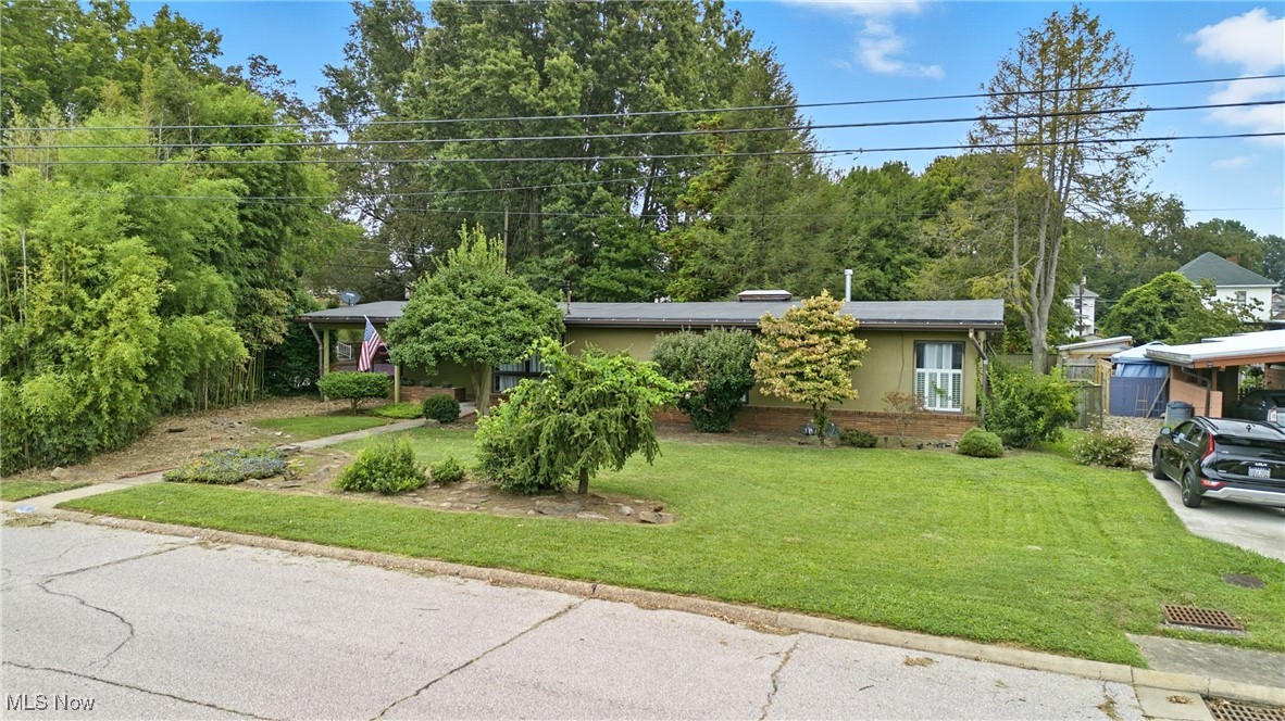 Mid-Century Modern Charmer on a Corner Lot!
Step inside this architectural gem where Mid-Century ranch style meets modern updates. Signature angular lines, a sleek flat roof, and walls of glass create an airy, light-filled vibe you’ll love.
This 3-bedroom, 1-bath, 1,288 sq. ft. home offers a fresh interior with newer laminate floors, plush carpet, updated lighting, and a stylish bath featuring a floating vanity and designer tile. The open floor plan flows effortlessly, making it perfect for everyday living and entertaining.
Enjoy privacy and beauty with mature landscaping and garden spaces surrounding your corner lot oasis. A pavilion-style garage/carport with covered side entry adds convenience and shelter.
Move-in ready and loaded with style—this one is the perfect blend of retro charm and modern comfort!