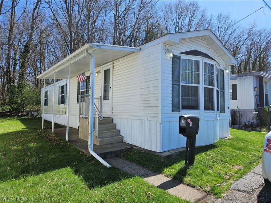 This cozy mobile home is move in ready!  Located in Hyland Park and convenient to most everything, it might be just the right fit for you!  The living room to kitchen with an eating area is nice & open and feels more spacious.  There are 2 bedrooms, 1 full bath and a laundry area.  The location is ideal just minutes away from shopping, eateries, expressway and more!  Call today to schedule your walk through.