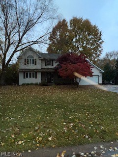 Large colonial home 4 bedrooms, 2.5 baths, Master suite has private bath. Large kitchen that is open to Livingroom, Dining room, Laundry on main floor. Sun room off Kitchen area. Attached 2 car garage. Full unfinished basement. Deck, fenced yard outdoor shed. on .50 acre