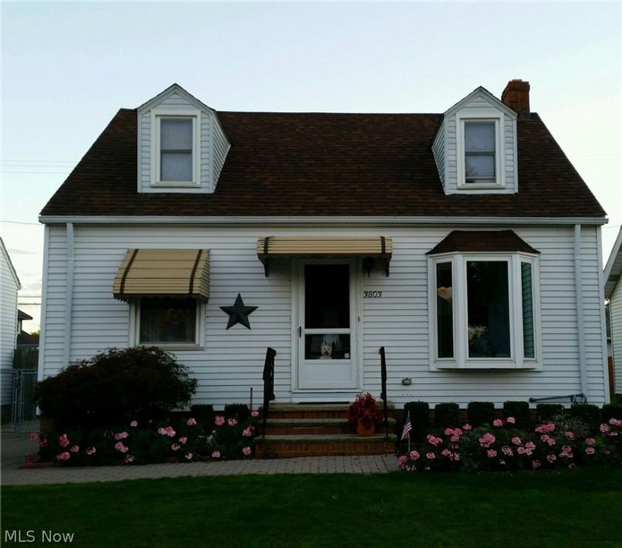 Sharp Immaculate 3 Bedroom Bungalow!  Beautiful Hardwood Floors! Lots of Fresh Neutral Interior Painting!  Cute Eat-In Kitchen – Refrigerator, Stove, Microwave – All Stay! Large Master Bedroom Up with Big Closet Area too! Updated Full Bath! Wonderful Finished Rec Room in Basement with Glass Block Windows and Half Bath!  Large Immaculate Laundry Area!  Updated Electric Panel! Vinyl Replacement Windows Thruout!  Newer Bay Window in Living Room and Newer Screen Doors – 2010! New Roof – 2011!  Great Oversized 2.5 Car Garage with 220 Line! This Spacious Garage was built in 1991 also! Inviting Covered Patio opens to a fully Fenced Back Yard area! This Home is Nicely Landscaped with a Sprinkler System too! A True Pleasure to Show! Don’t Delay on This One!