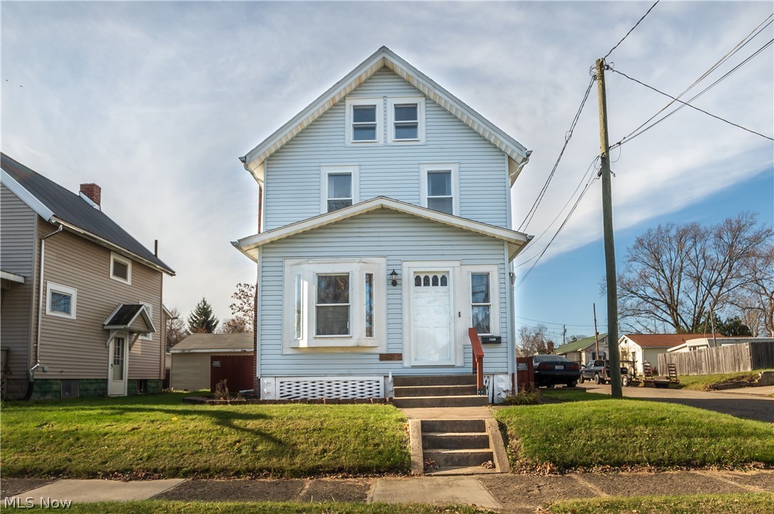 Welcome to 1229 Clarendon Ave SW. This beautiful well-kept Colonial home has been loved and taken care of since 1983. This home features three bedrooms and one full bathroom that was recently updated in 2018. Walking in the front door you will be greeted by the enclosed front porch that has been converted into another living space inside the home. Through the front porch, you'll enter the spacious living room with views of the dining room and kitchen. Above the first floor you with have plenty of living space with two good sized bedrooms as well as a large bathroom, and the attic that has been finished into a third bedroom. Some recent updates to the home include the Bathroom with new windows in the bathroom (2018), Garage roof (2017), new Furnace, AC, Hot Water Tank, and Dryer (2019), and two Storm doors (2018).