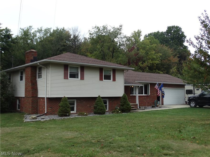 Move in ready! This 5 bedroom 2 1/2 bath home boasts hardwood floors throughout, cedar lined closet and cedar storage nook, walk out lower level houses your family room with fireplace, 5th bedroom, half bath and laundry room. Private back yard. 2 car attached garage, concrete driveway (2014), Back patio (2016), appliances stay with purchase of home. New front window and sliding glass window. 4 1/2 foot cemented basement crawl (access through closet door)  for all of your storage needs.Great area of well maintained homes, just down the street to grocery shopping, banking, gas. New Dishwasher January 2018