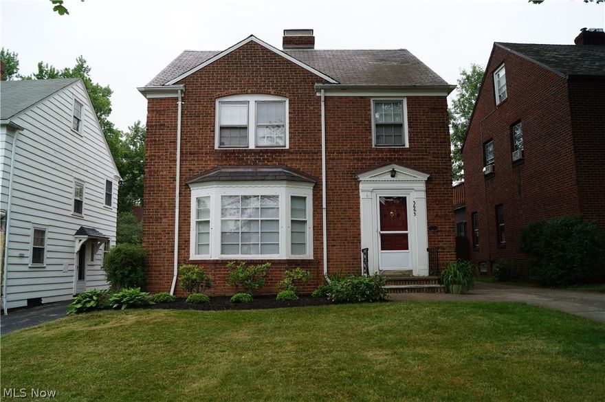Stately all brick colonial with finished 3rd floor. Spacious living room with large bay window and wood burning fireplace. Formal dining room with built in china cabinet. Stunning renovated kitchen with a new gas range, lots of cabinets, gorgeous granite counters and separate eating area. Wonderful screened porch for casual relaxing. The second floor features large bedrooms including a master with his and her closets. A hidden treasure is the finished 3rd floor with a full bath perfect for guests or a private retreat. The lower level features a cozy knotty pine family room with built in desk and shelves and a wood burning fireplace plus a large storage area. This home has charm galore with custom fluted moldings, cove ceilings, gleaming refinished hardwood floors. Outside there is a 2 car garage with opener, concrete driveway and newer landscaping. Lovingly maintained, this home is an unbelievable value.