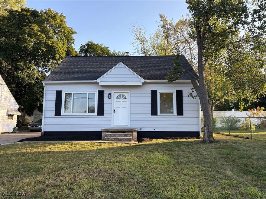 This is a nice, cozy, three-bedroom Cape Cod home.  This home has been updated throughout.  The kitchen and bathroom have been updated.  The living room features a lovely recessed electric fireplace.  The home has been freshly painted.  It has new vinyl flooring and new carpet throughout.  There is a large finished attic that serves as a third bedroom.