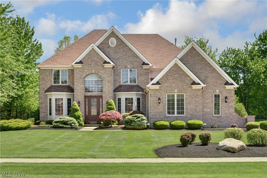 Wonderful Colonial home in The Estate’s neighborhood is certain to impress.  Open floor plan with loads of upgrades throughout.  2 story foyer to greet your guests.  Formal living and dining rooms.  Gourmet kitchen offering granite counters, high-end KitchenAid stainless steel appliances, island, 2 walk-in pantries and hardwood floors… that opens to the 2 story family room with fireplace and hardwood floors.  1st floor office / den.  1st floor laundry room.  Spacious master suite offering vaulted ceiling, huge walk in closet with built-ins and glamour bath with stand up shower and soaking tub.  Dream basement is completely finished and includes recreation & theatre room with surround sound audio, exercise room, additional bedroom or hobby room, full bath with steam shower and bar room decorated as your own Old English Pub… the perfect place to entertain.  Backyard offers brick paver patio with fire pit, hot tub, built in gas grill and stone & granite bar… all professionally landscaped