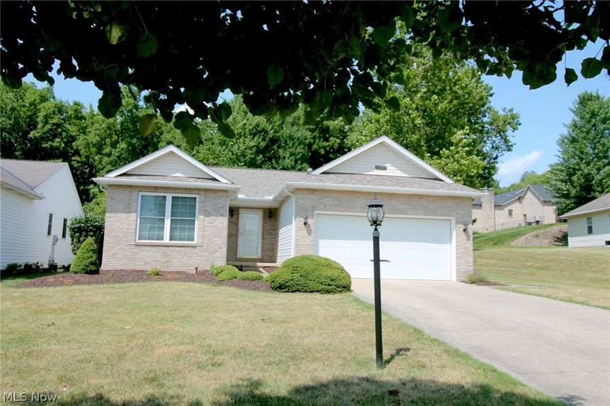 You'll want to see this highly sought after, maintenance free ranch cluster. with a full basement. The setting is semi-private and pretty peaceful as there is only one other home close by. The back yard is wooded . The front faces down a small cul de sac street. There is a huge open area to the east before the next home. Inside the floor plan is open, comfortable and designed for easy living with vaulted ceilings in spacious rooms. In the kitchen you'll enjoy the convenience of an island for extra counter space, pull outs in the lower cabinets and a pantry. Sliding glass doors open to a patio that looks beyond to a wooded rear yard, offering privacy. There are two large entrance ways off the kitchen into the great room, ideally located in the center of the home. The guest bedroom is located in the front of the home, next to the main bath, while the owner's suite ,with a full bath and walk-in closet, is located at the back. The first floor laundry room has access from the garage to the kitchen and basement and includes another pantry. Bring your creative ideas to lay out in the clean, dry, painted, 12-course block basement. You could have an enormous recreation room or build out an in-law suite. If you keep it unfinished, use it for storage or as work space. the possibilities are endless. This home is in excellent condition with a new roof in 2023. The HVAC has been serviced annually. This is a great value.