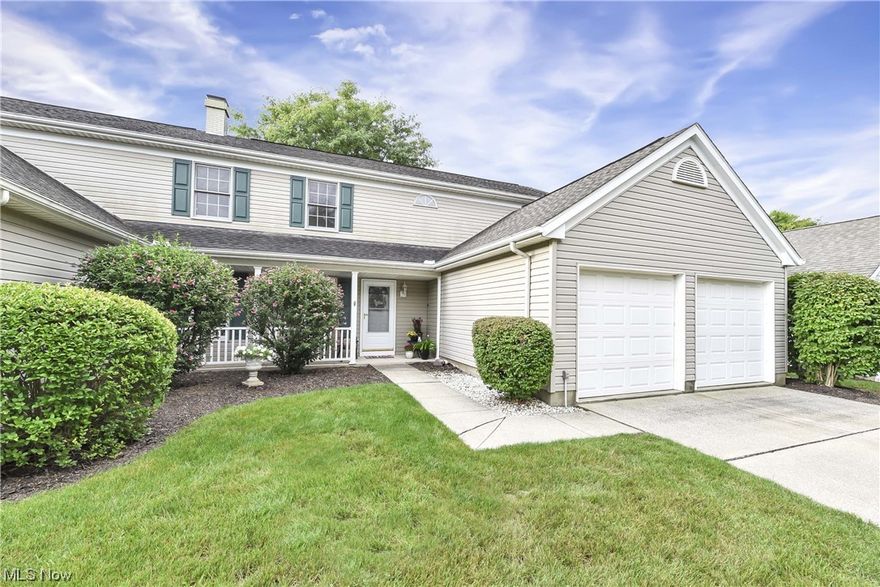 Prepare to be Moved! This beautiful cluster-style home is nestled in the Springfield Commons neighborhood of Strongsville, Ohio. Step inside and you'll find a spacious main floor with vaulted ceilings and plenty of natural light. Cozy up to the gas fireplace in the living room for a relaxing evening in. The huge arched window in the dining room overlooks the backyard and will create a bright and inviting atmosphere for entertaining or family meals. The eat-in kitchen features a walk-in pantry and access to the private patio. You'll have a choice of a first or second-floor master ensuites. With a full bathroom on the main and second floor you have added convenience. The first-floor laundry is also a great added bonus. Head upstairs to find two additional bedrooms and a loft that can be utilized as a family room or office. The well-kept home is move-in ready and features a two-car attached garage, a shade tree out back for extra privacy and seclusion, and a covered front porch. Nearly ma