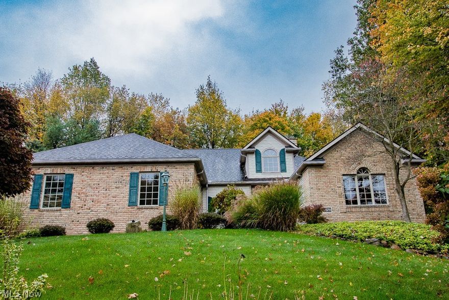 Welcome to this beautiful one owner home in the prestigious High Hampton neighborhood.  Not a drive-by, over 2500-SF not including huge finished lower level.  Granite foyer w/ 20-foot ceilings leads into huge great room that boasts of see-through fireplace and continues on to a 25x14 foot gorgeous dream kitchen that has granite counters and over 40-cupboards.  Gleaming hardwood floors throughout.  Has enclosed 16x17 sun room that leads to porch and overlooks the beautiful scenic lot for entertaining.  Master bedroom has glamour bath with separate shower.  Lower level has oversized bedroom and bath plus 36x15 foot finished rooms, could be office plus weight room, etc.  Also 46x28 foot extra room that could be finished into a rec room.    Also has home sprinkler system and security system.  Home Warranty included.