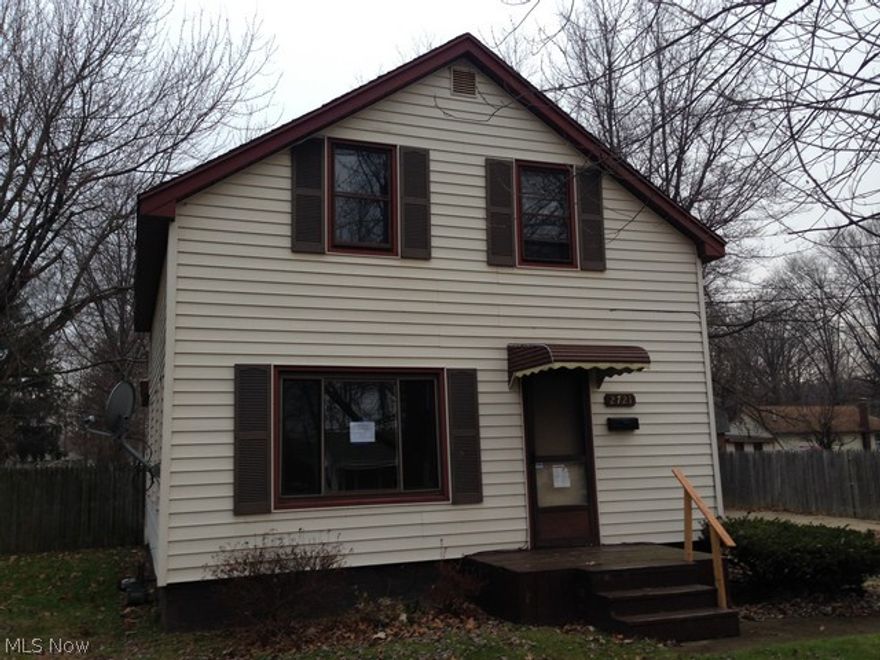 Main floor bedroom with main floor full bath, 2 more bedrooms with a full bath upstairs,  no basement to worry about, nice fenced in back yard, and 2 car "garage" that is ready to finish along with a great price make this one a great find!
