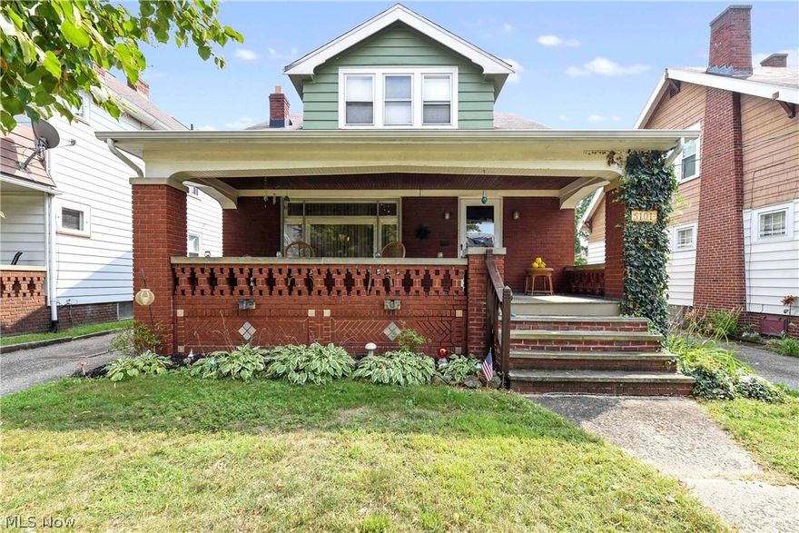 Be prepared to move !  This spacious 4 bedroom, 2 full bath home is sure to impress.  With an impressive 1841 square feet (not including finished area of basement) there is plenty of room for everyone.  A welcoming front porch is a perfect place for summer relaxing enjoyment.  Inside is a large living room complete with a gas fireplace flanked with built-in glass cabinets, leaded glass windows, and crown molding.  Formal dining room with bench seating and fabulous built-in china cabinets and more crown molding. Gleaming hardwood floors throughout most rooms.  Classic kitchen with crisp white cabinetry, tile back splash and all appliances are included. Off the kitchen is a convenient mudroom area leading outside.  First floor also has 2 bedrooms and a full bath which is hard to find.  Upstairs is a large master suite with bonus sitting area and generous walk-in closets, large full bath and fourth bedroom.  Basement is partially finished with bar area, perfect for watching movies, video