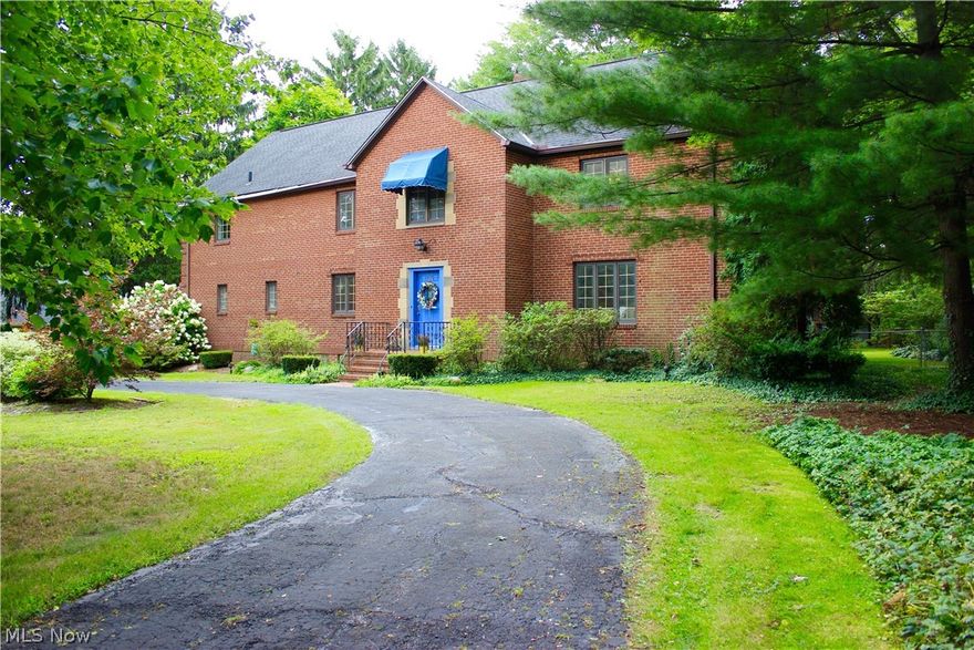 ALL BRICK GRAND COLONIAL IN FAIRLAWN. 5 bedroom 5 bathroom, 3800+ sq ft. Picturesque staircases lead to the upstairs bedrooms and baths. 2 of the bedrooms have dedicated bathrooms, 2 other bedrooms share a bath. So many options for your family or guest. The 5th bedroom is currently a office. The attic is plumbed and powered for additional living space. Dedicated Library with built in bookcases and fireplace. The 4 seasons room off of the Library and Kitchen is adorned with decorative crown molding and picturesque windows framing the park like setting back yard. Off of the 4 seasons room is a multi level deck ready for entertaining. The fenced in backyard boasting .66 of an acre anchors this beautiful property. The current owner has raised her family here and now it's time for you to raise yours. Come see this gorgeous spacious Colonials in one of Akron's most desired neighborhoods.