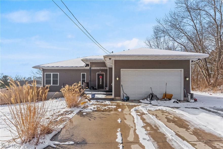 Welcome to this private oasis on almost 2 acres of land with a beautiful newer home (2014) that offers
approximately 2840 square feet of living space! Quality materials and construction are evident
throughout this bright open floor plan ranch home with 2x6 construction and R19 insulation in the walls
and R38 in the ceilings. The 9’ ceiling height throughout with 11’ ceilings in the foyer and great room
and Brazilian hardwood flooring throughout the great room, kitchen and dining area give a luxurious
feeling to this home with many recent updates to lighting and fans. The walkout basement has been
thoughtfully finished to add approx.1000 square feet more of beautiful living space. The floors have a
concrete overlay that looks like hardwood flooring for a beautiful aesthetic while easy to clean and
maintain. Black walnut built-in cabinetry and wrap on support pillars add warmth and character. In
addition, a generously sized fourth bedroom and third full bath make this space perfect for your family
or guests. You’ll be able to walk right out to a private fenced-in patio area of stamped concrete,
surrounded by beautiful retaining walls, complete with a firepit for those summer bonfires! Exterior
security cameras have been installed as well, and you’ll find many upgrades to make a healthy home like
a whole house air filtration system, a UV sterilizer added to the furnace, and a reverse osmosis filtration
system. A 200 amp electrical service in the garage plus a 100 amp service in the basement provide
plenty of power for all your needs. The HWT and well pump were replaced in 2025 and a reverse
osmosis filtration system was installed as well. Schedule your tour today before this one is gone!