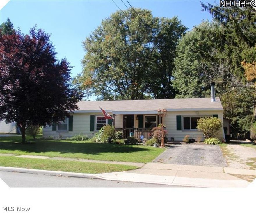 You won't want to miss the opportunity to own this updated Ranch in Stow at a great price. Home offers open floor plan with expanded living room with wood burning fireplace. Hardwood flooring throughout the home for easy cleaning. Updated eat-in kitchen features oak cabinets, granite tile counters, Travtine stone tile flooring, Mosaic glass tile backsplash and floor to ceiling cabinet to house full size stackable washer and dryer. Updated bathroom with whirlpool tub and ceramic floor. Crown molding in several rooms add to the decor of the floor plan. New furnace-2010, 50 gallon Hwt-2011, new roof and wood under shingles in August-2013. This gem sits on a 70x150 level lot with a fish pond, brick fire pit and a patio large enough for large party entertaining all summer and fall. Seller is  offering a Home Warranty to the new Buyer. This home is located within minutes to shopping, schools, restaurants, and freeway.