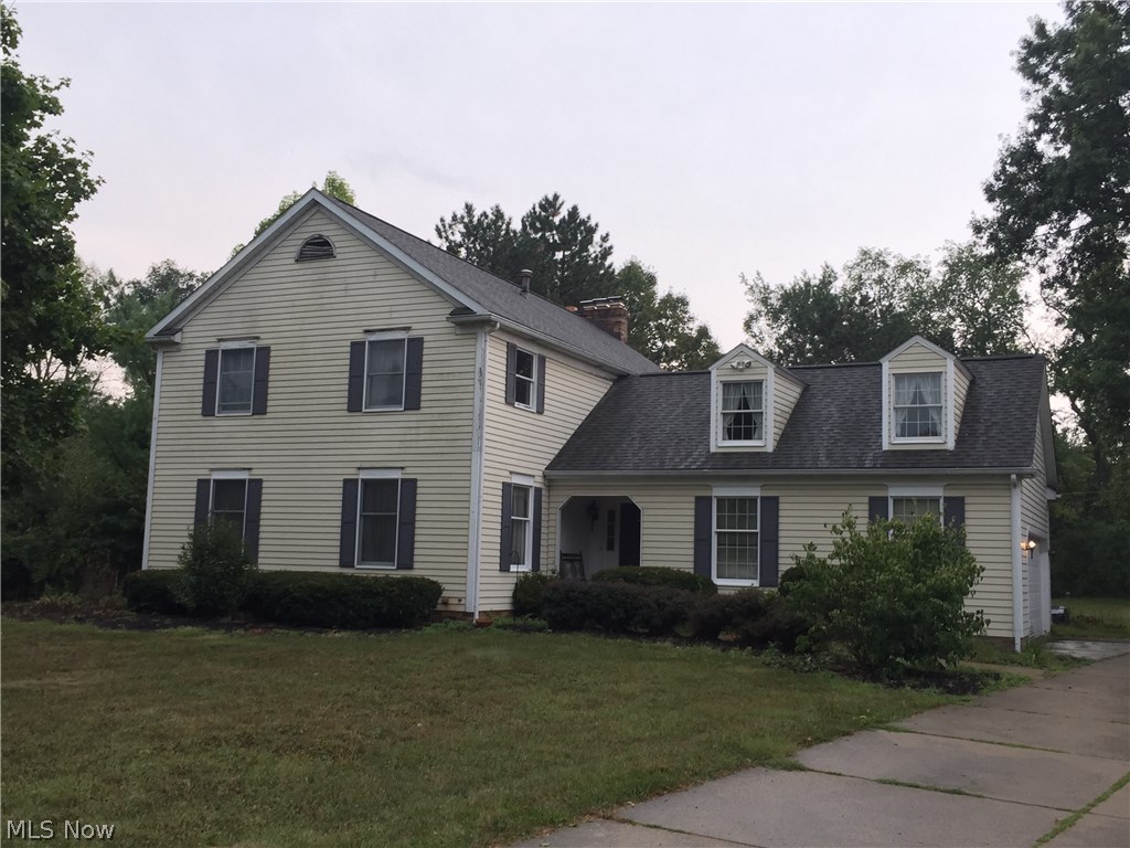Check out this home with TONS of potential in a great neighborhood! This large home has an enclosed porch/patio, a huge sunroom with vaulted ceiling and skylights, a family room with beamed ceiling, built in cabinets/bookshelves and fireplace. The first floor also has a large eat-in kitchen, formal living room and formal dining room with wainscoting. The entire house has oak trim, and oak crown moulding throughout most of the first floor. Rustic ceramic tile floor in foyer & entryway. First floor laundry. Master bedroom has its own gas fireplace, cathedral ceiling, and is absolutely huge! The master bathroom is set up with a tub/shower combo and double vanity. Full basement with a full bath, office, and even a sauna! This home needs some elbow grease and deferred maintenance taken care of but will be a GREAT home for a move up or starter home or even a great family home palace with some work! This yard is awesome; almost an half acre to roam and spread out! Enjoy the feel of suburban l